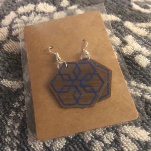 Homemade wooden earrings.  Snowflake blue